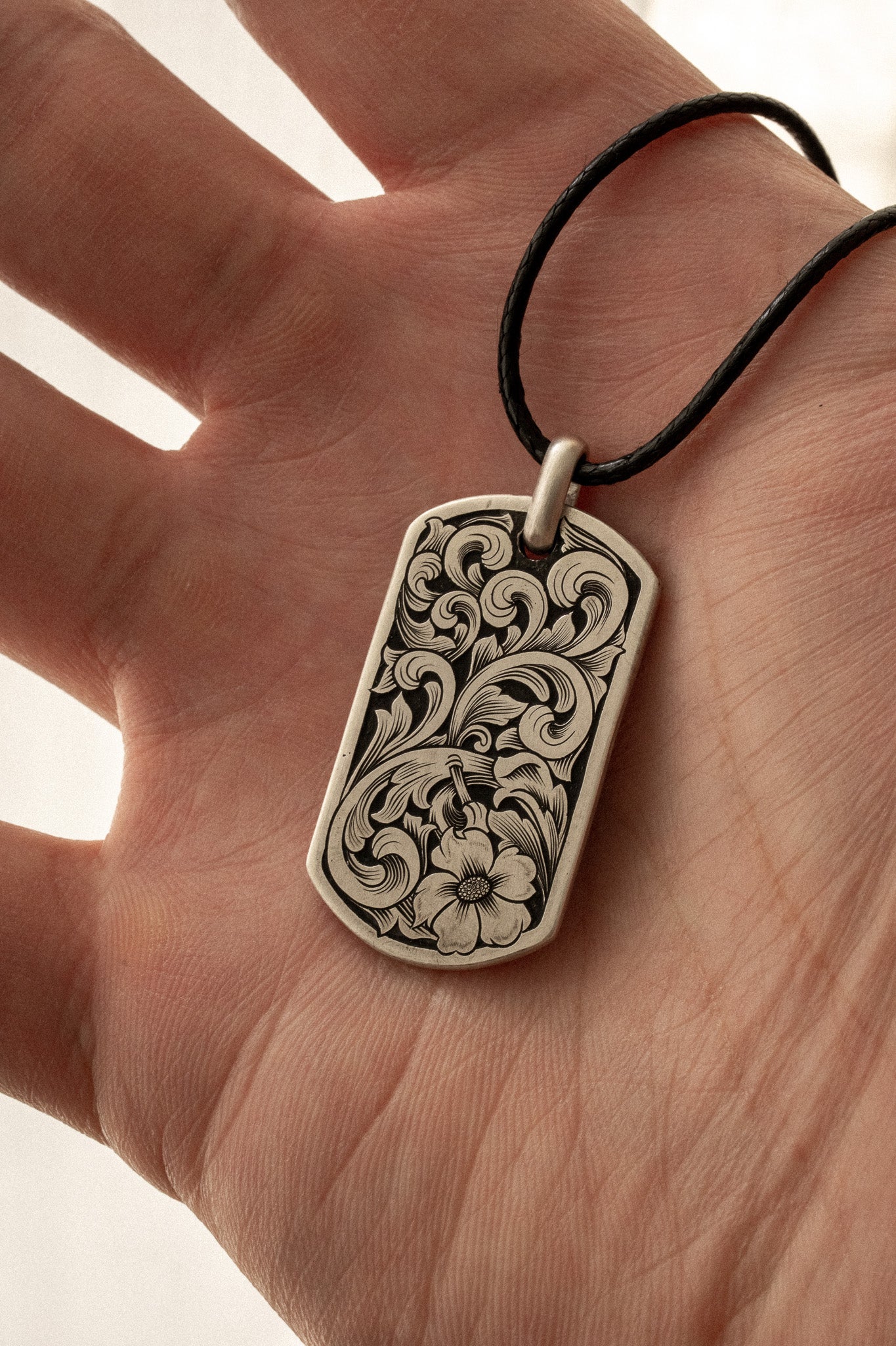 Pendentif gravé